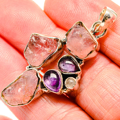 Sterling silver pendant with pink rose quartz and purple amethyst cabochons, top bail