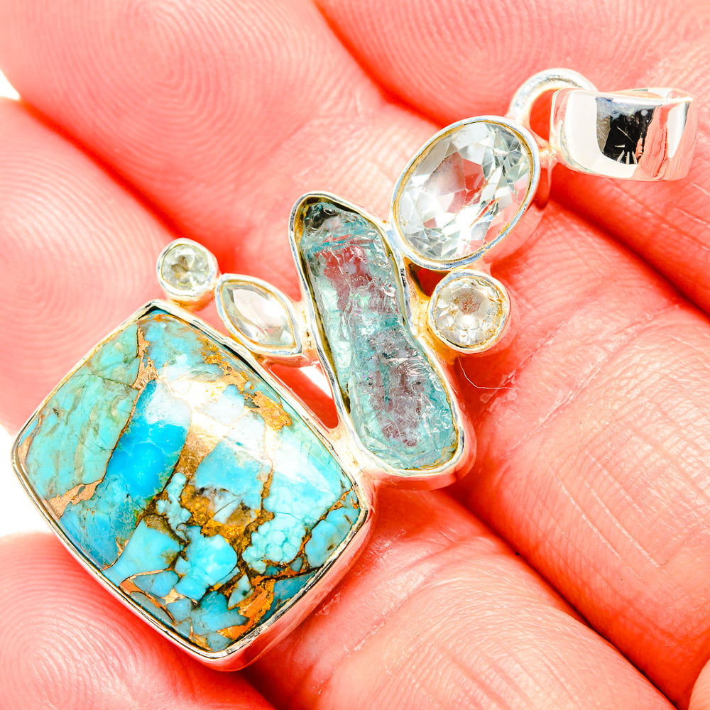 Close-up 925 sterling silver pendant: turquoise square stone, blue-green bar, clear round stones