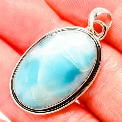 Larimar pendant close-up, oval sterling silver bezel with top teardrop bail