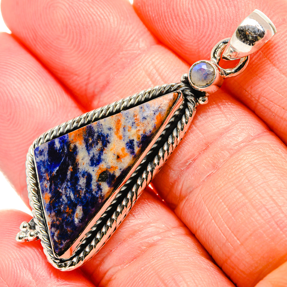 Sterling silver pendant with triangular sodalite stone and small moonstone accents