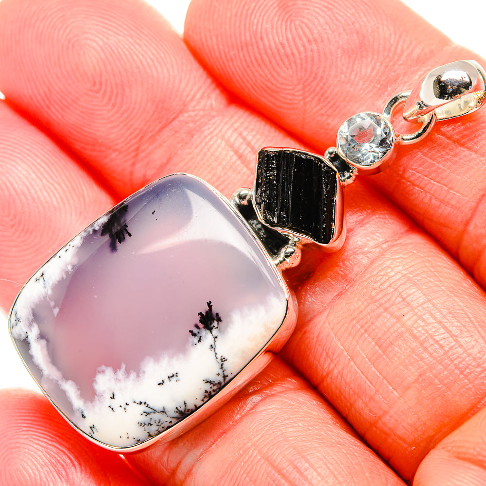 Oval dendritic opal pendant in sterling silver with black tourmaline and blue topaz accents