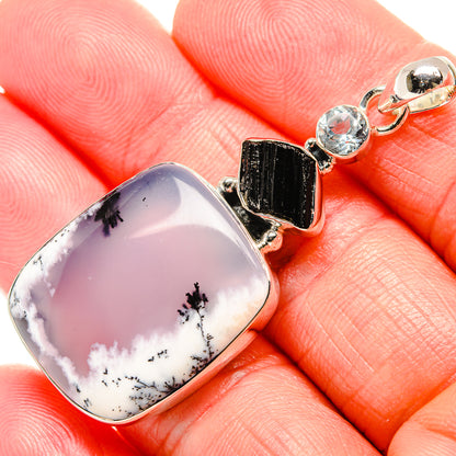 Oval dendritic opal pendant in sterling silver with black tourmaline and blue topaz accents