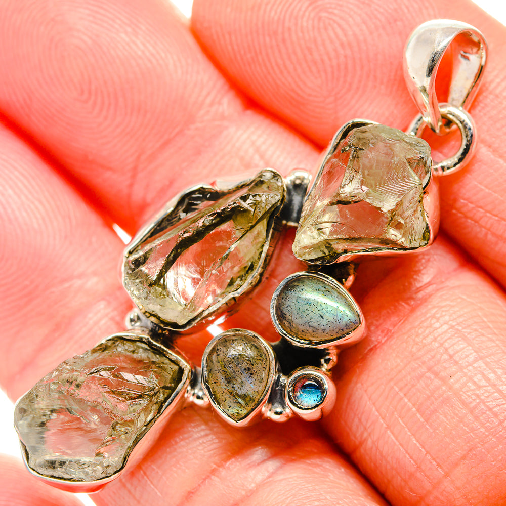 925 sterling silver pendant with rough green stones and blue labradorite accents
