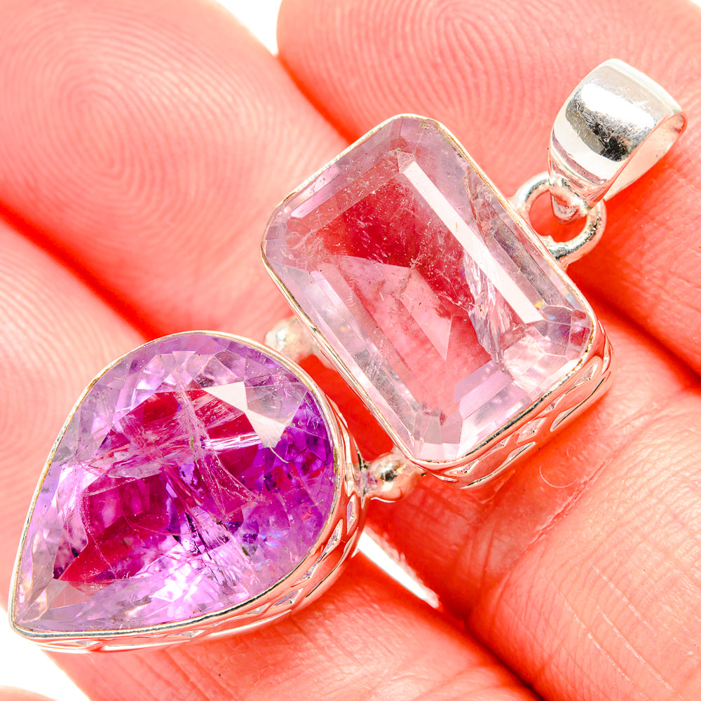 Amethyst pendant close-up with faceted rectangular stone and pear stone in sterling silver