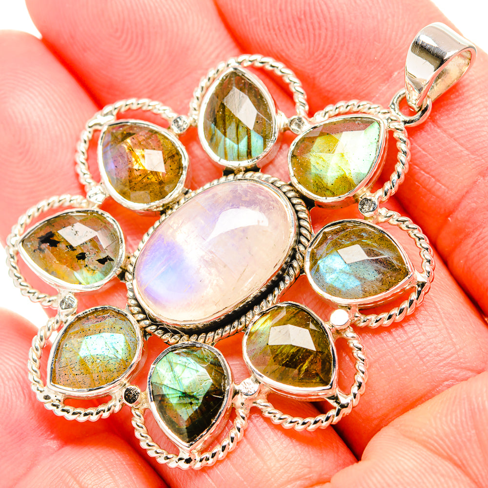 Sterling silver labradorite pendant with oval and round iridescent cabochons, rope bezel