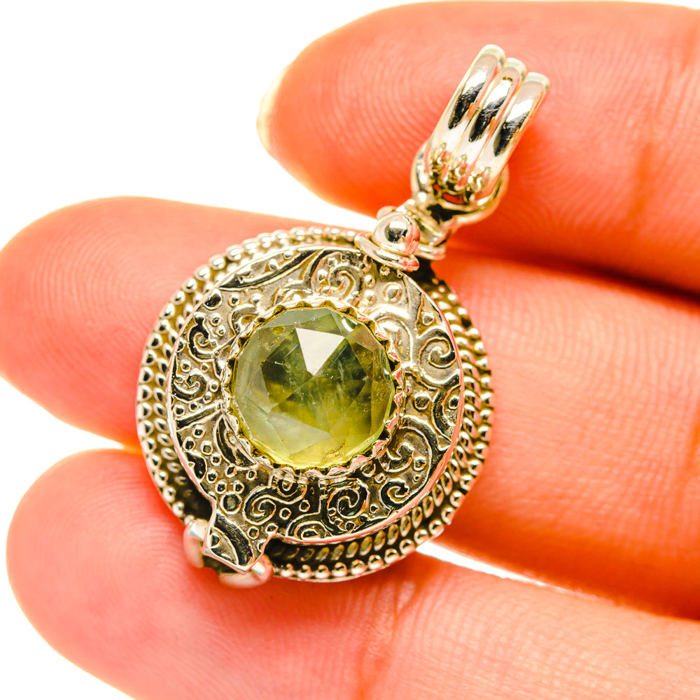 Sterling silver prehnite pendant with round green gemstone and detailed filigree bail