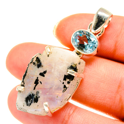 Rough moonstone pendant with blue topaz accent in 925 silver bail