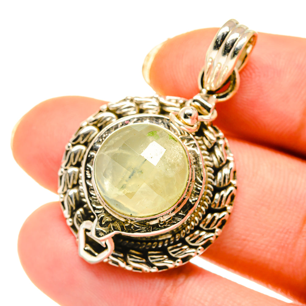 Round prehnite pendant in 925 sterling silver with ornate border and loop bail