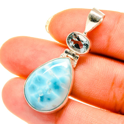Sterling silver pendant with oval sky-blue cabochon and small blue top stone