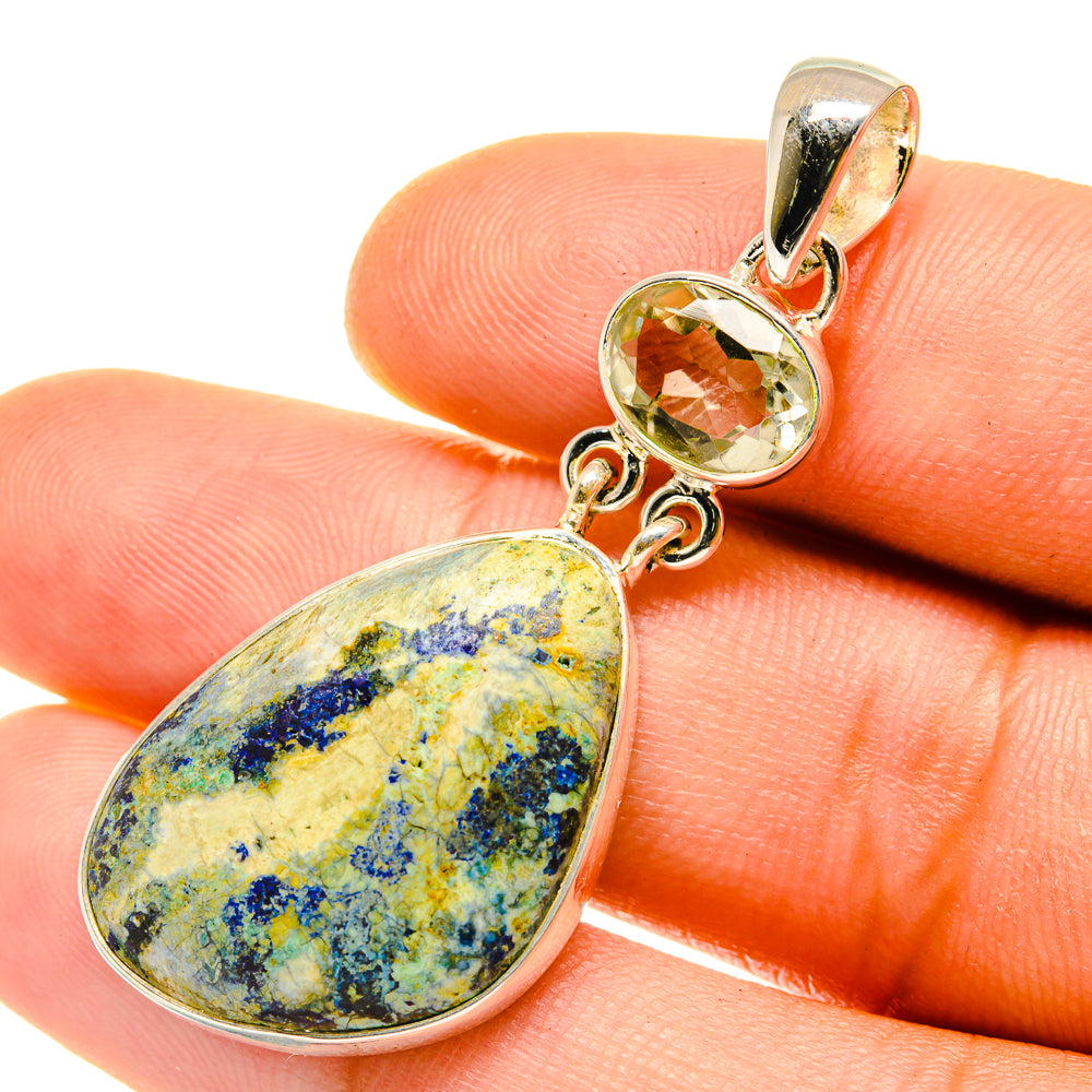 Silver pendant with blue-yellow-green teardrop stone and small yellow round stone