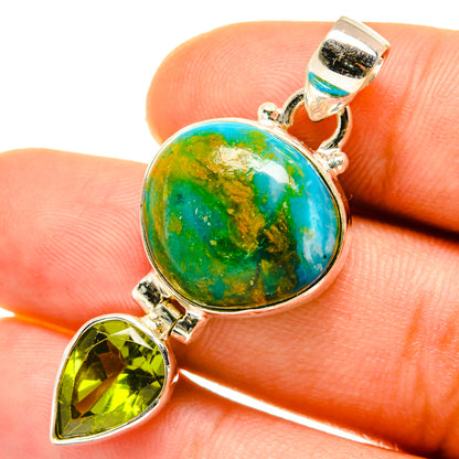 Sterling silver pendant with round green-blue opal cabochon and peridot teardrop accent