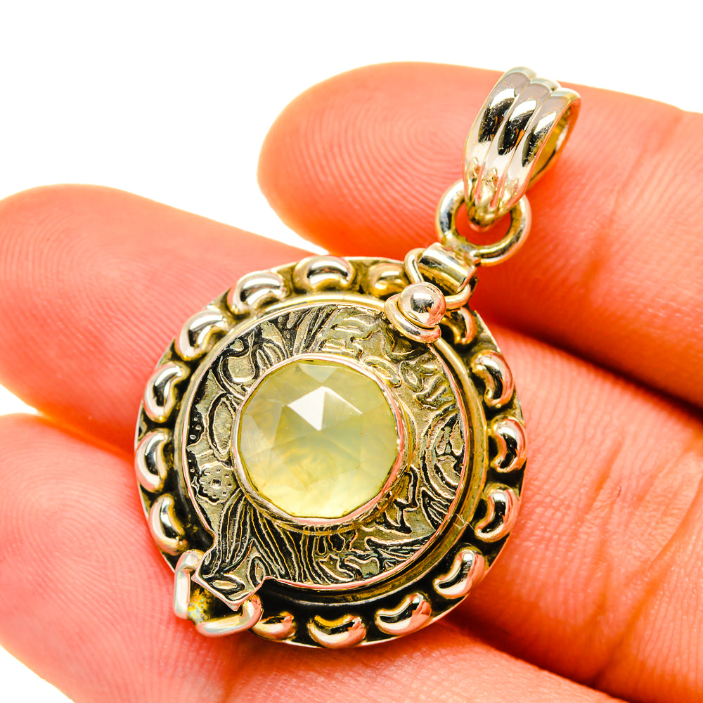 Prehnite poison pendant, round light green gemstone in ornate gold-tone frame