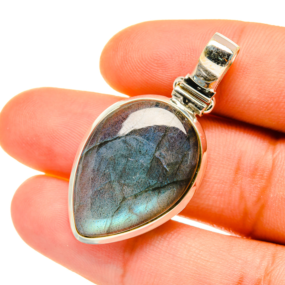 Sterling silver labradorite pendant with teardrop cabochon; blue-gold flash