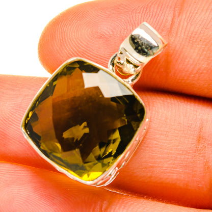 Olive quartz pendant with faceted teardrop stone and bail in sterling silver