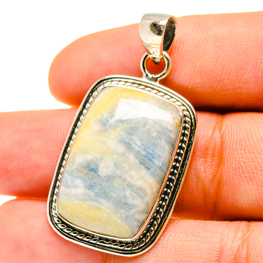 Sterling silver scheelite pendant with rectangular blue-white stone, teardrop bail