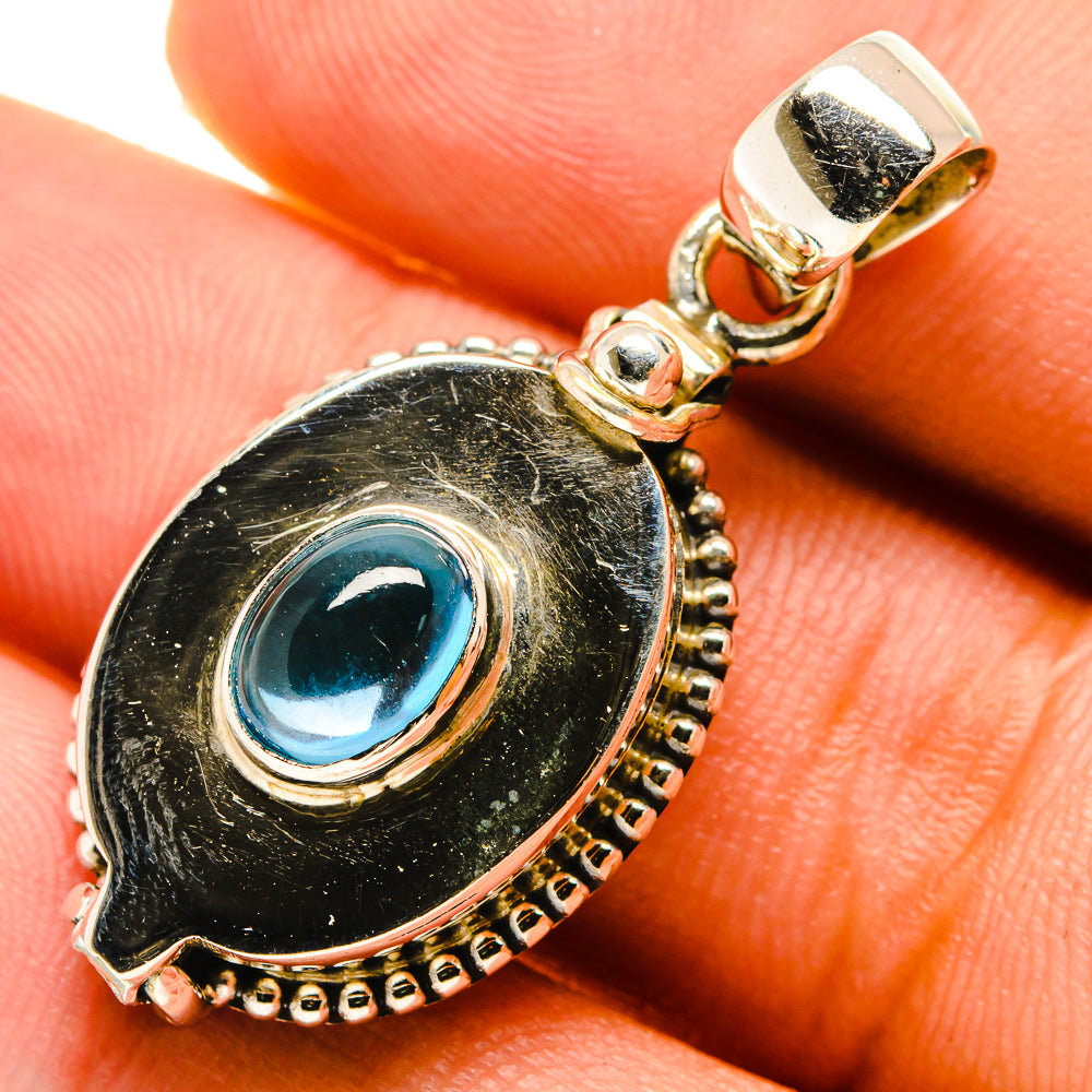 Blue fluorite cabochon pendant with oval bezel and bail, 925 sterling silver