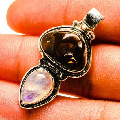 925 sterling silver pendant with oval amber fire agate and opalescent rainbow moonstone