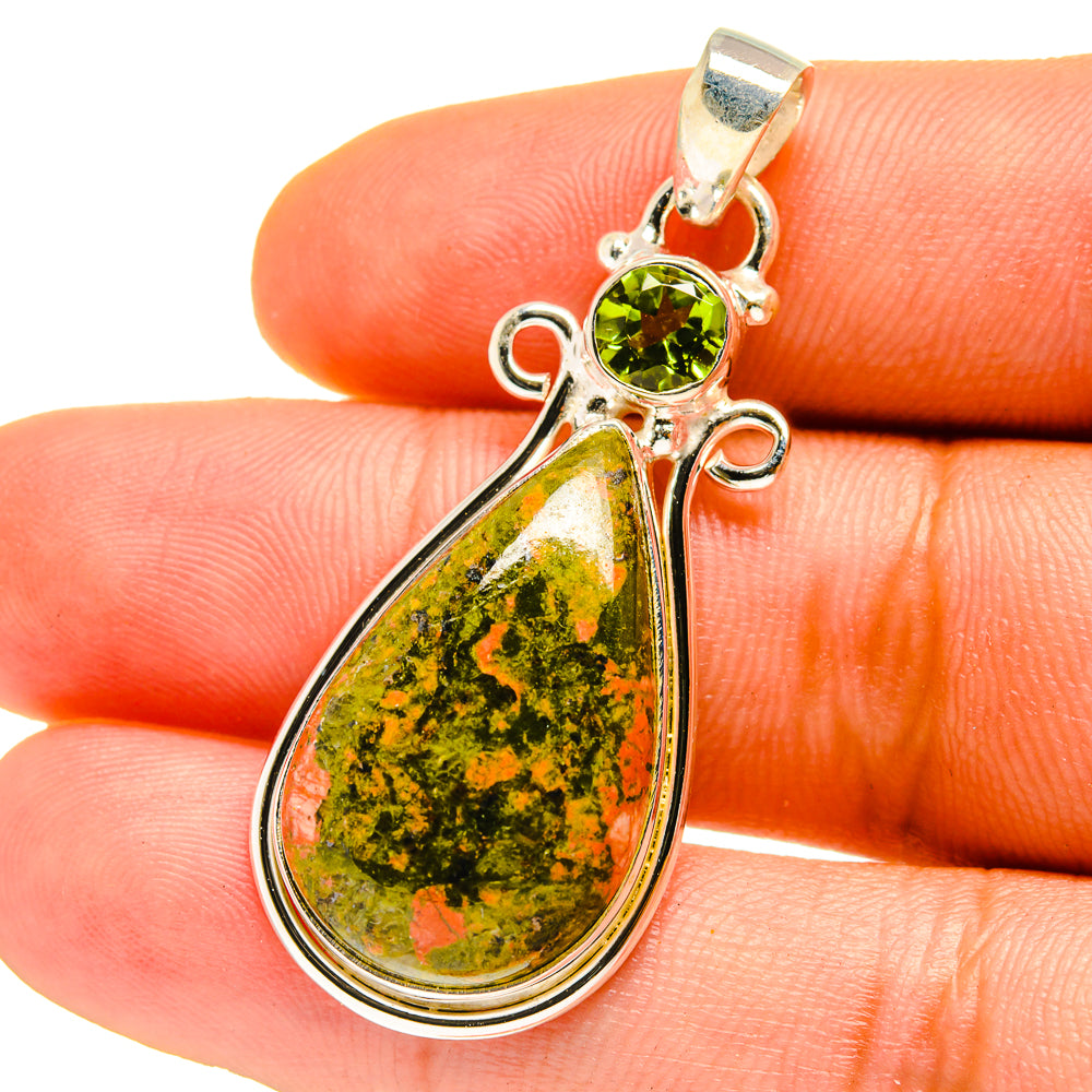 Sterling silver pendant with teardrop unakite stone and round peridot-like green accent