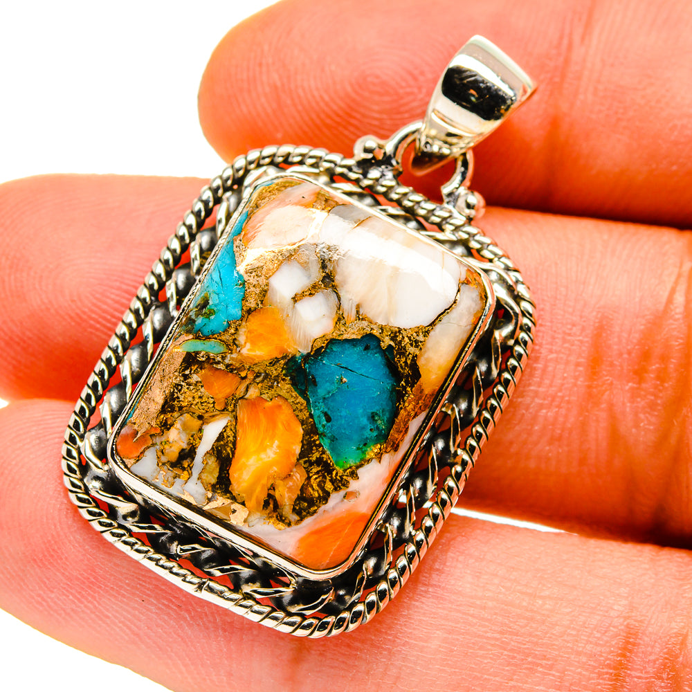 Turquoise and copper composite pendant with square framed cabochon, sterling silver bail.