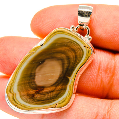 Yellow-brown marbled jasper pendant with sterling silver bail on top