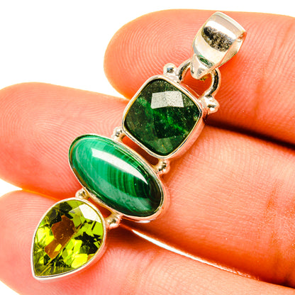 Sterling silver pendant with square green stone, oval green stone, and yellow-green teardrop