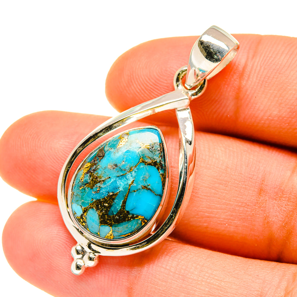 Turquoise teardrop pendant in sterling silver with blue stone and gold matrix