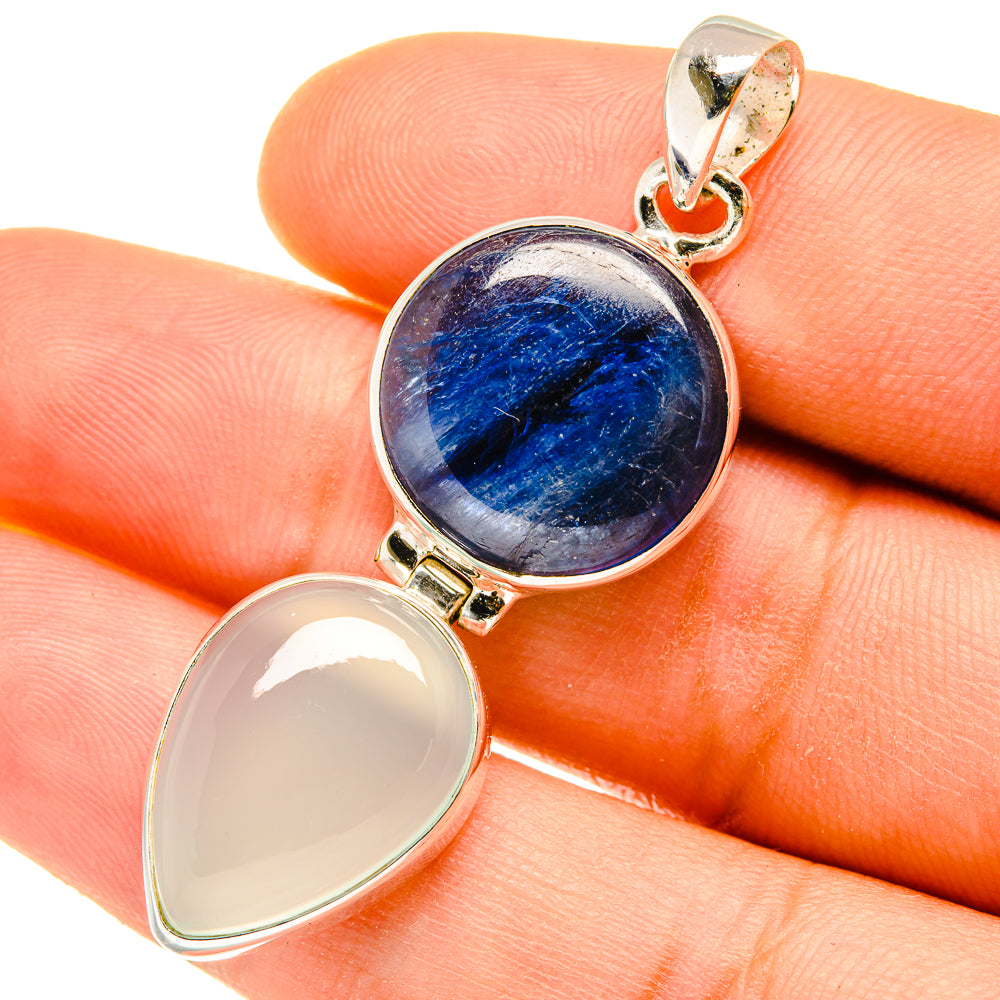 Sterling silver pendant with round dark-blue chalcedony and pale oval stone bail