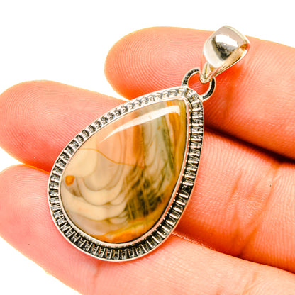 Teardrop jasper pendant in 925 sterling silver with textured bezel and bail