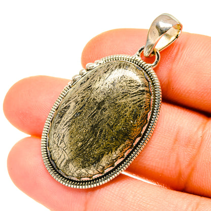 Pyrite agate pendant with oval green-gold stone in sterling silver bezel and bail