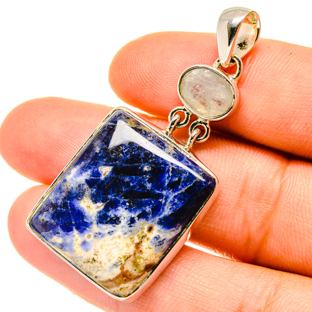 Sterling silver pendant with blue sodalite rectangle and round moonstone cabochon