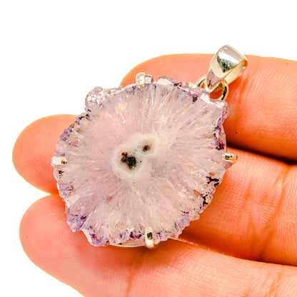 Amethyst stalactite pendant close-up, faceted purple crystal slice in prong setting