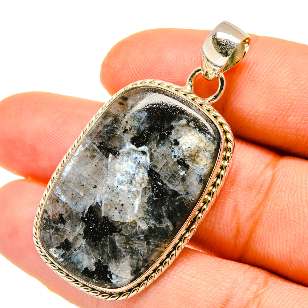 Gabbro stone pendant with gold-tone 925 silver bail and oval black, blue, and gold cabochon