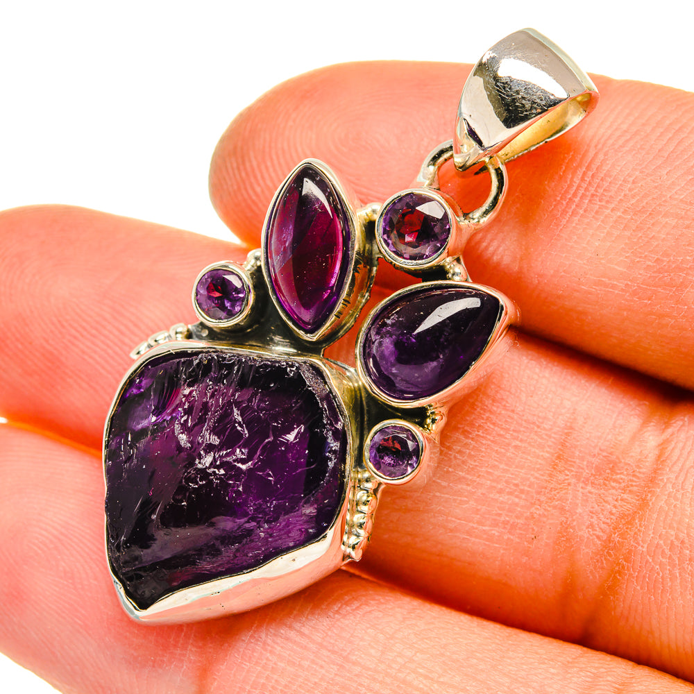 Rough amethyst pendant in 925 sterling silver with purple stones, open oval and round accents