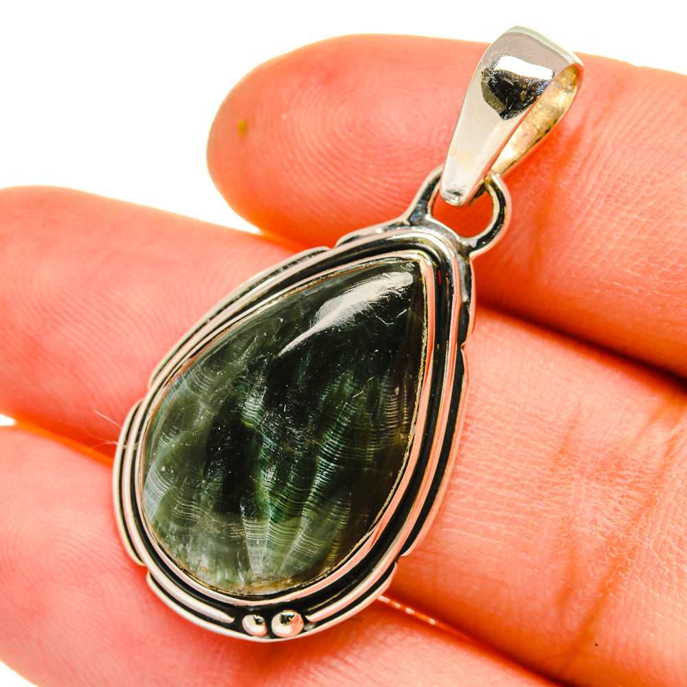Seraphinite pendant close-up with 925 sterling silver bezel and teardrop green stone