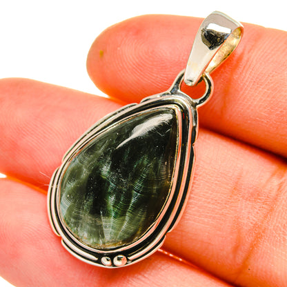Seraphinite pendant close-up with 925 sterling silver bezel and teardrop green stone