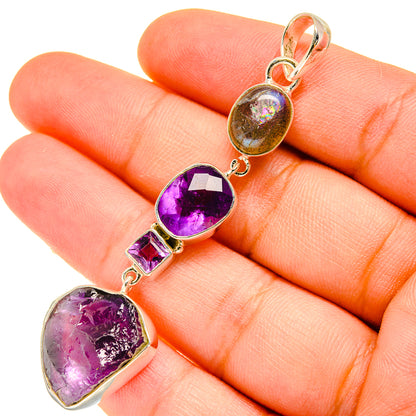 Amethyst and labradorite pendant in sterling silver, rough purple heart with oval stone
