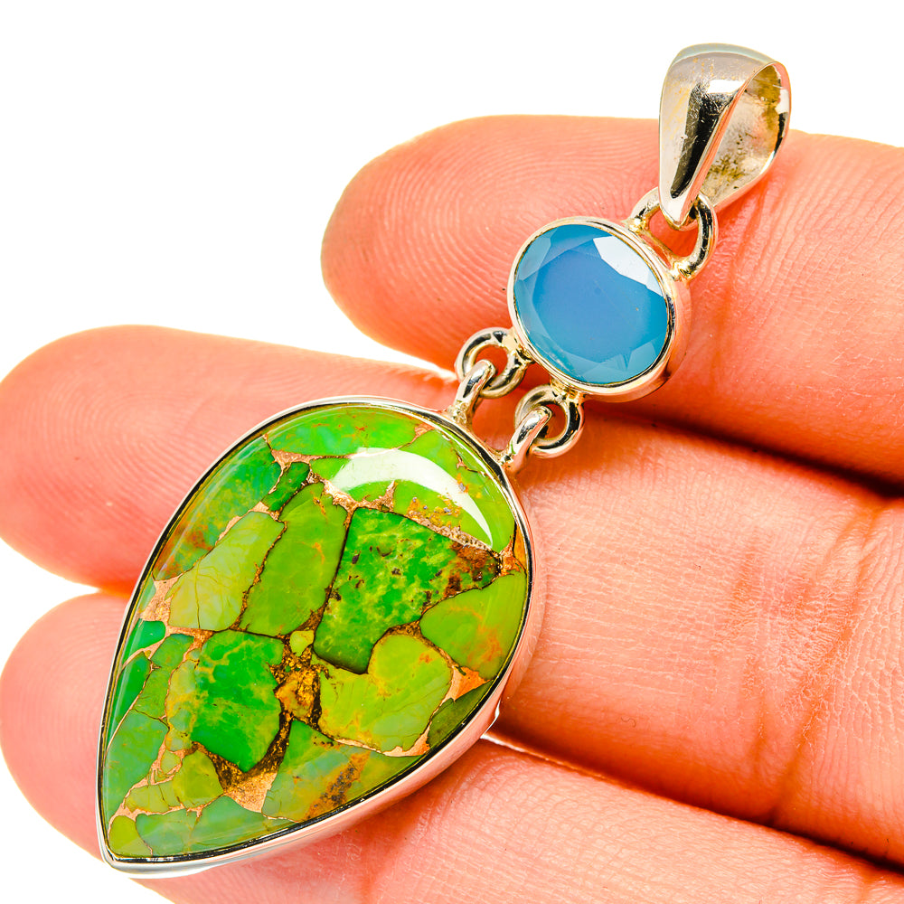 Green turquoise teardrop pendant with blue top cabochon and silver bail