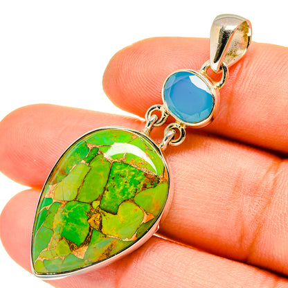 Green turquoise teardrop pendant with blue top cabochon and silver bail