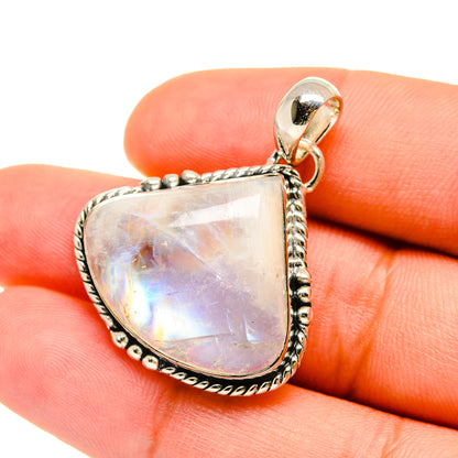 Rainbow moonstone pendant in 925 sterling silver, teardrop bezel with iridescent shimmer