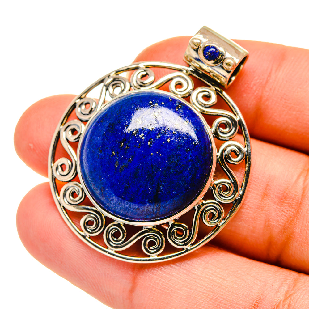 Lapis lazuli pendant in ornate 925 sterling silver with round blue stone and gold bail