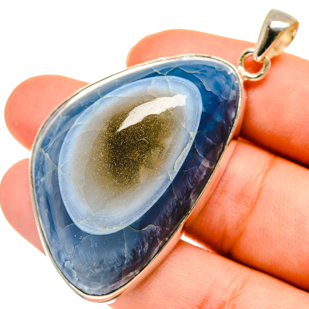 Opal pendant with blue oval-teardrop stone set in 925 sterling silver