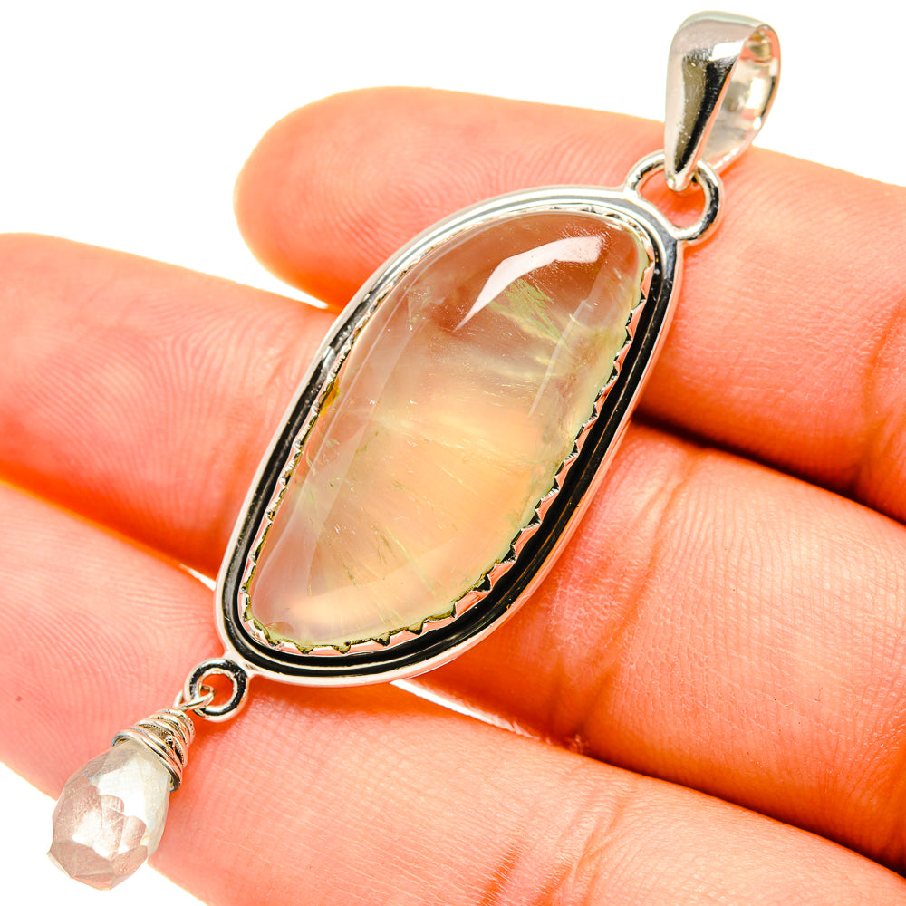 Oval prehnite-like pendant with white quartz drop, 925 sterling silver bezel setting.