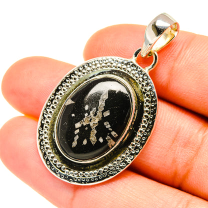 Sterling silver oval pendant with black stone and oval beaded border