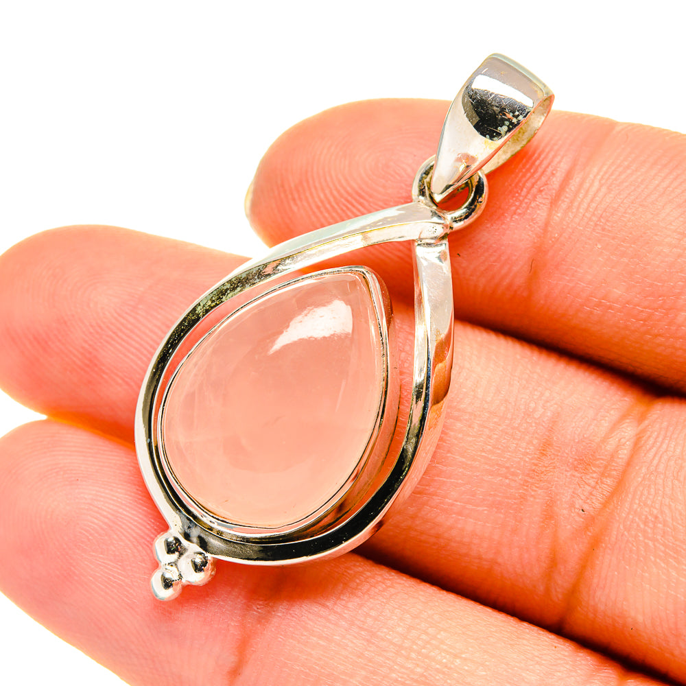 Teardrop rose quartz pendant in 925 sterling silver with bail and small floral charm