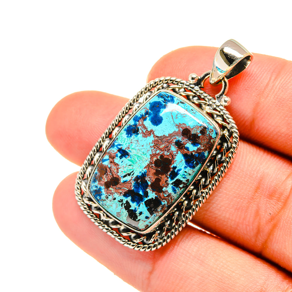 Sterling silver shattuckite pendant close-up, blue rectangular stone