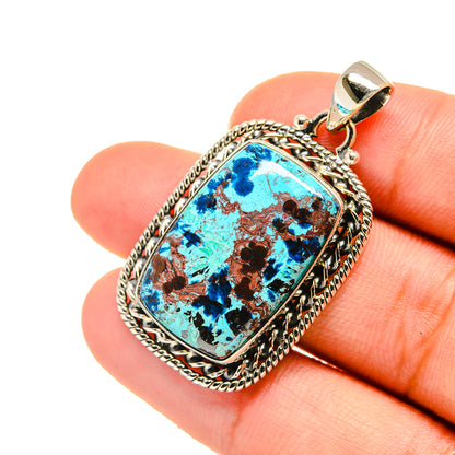 Sterling silver shattuckite pendant close-up, blue rectangular stone