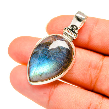 Teardrop labradorite pendant with blue flash gemstone and silver bail