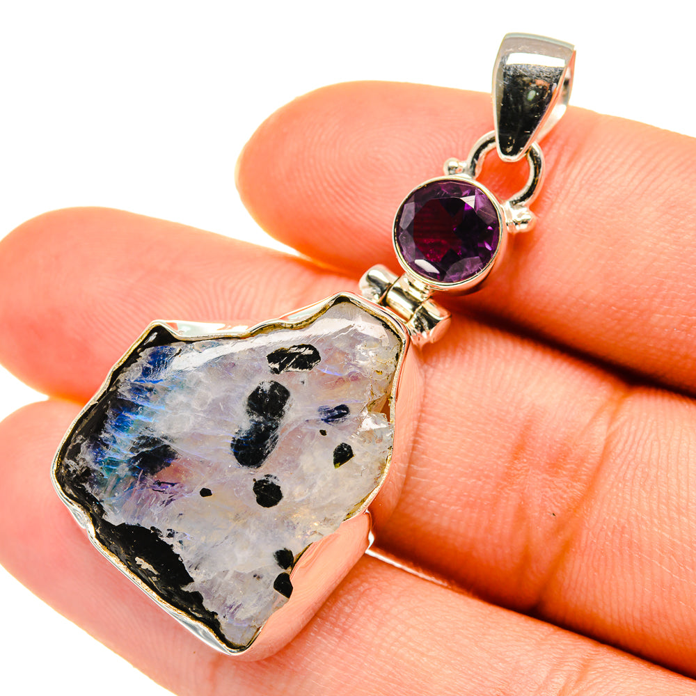 Rough moonstone and round amethyst pendant in polished sterling silver, top loop view