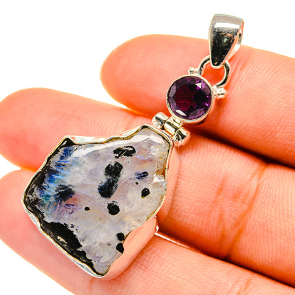 Rough moonstone and round amethyst pendant in polished sterling silver, top loop view