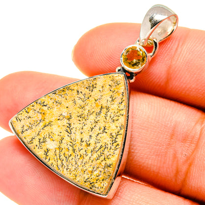 Triangular dendrite stone pendant with round citrine in silver bail